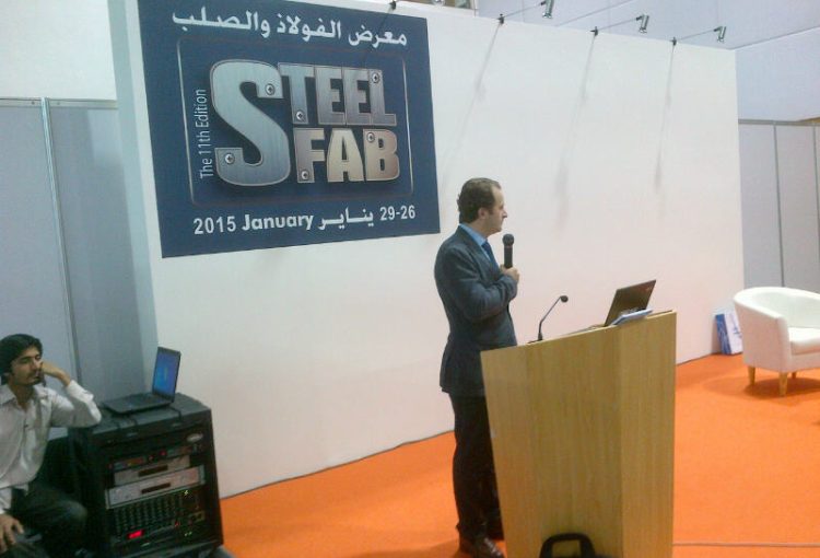 Image from the Sharjah speech event, featuring a speaker addressing the audience on important topics